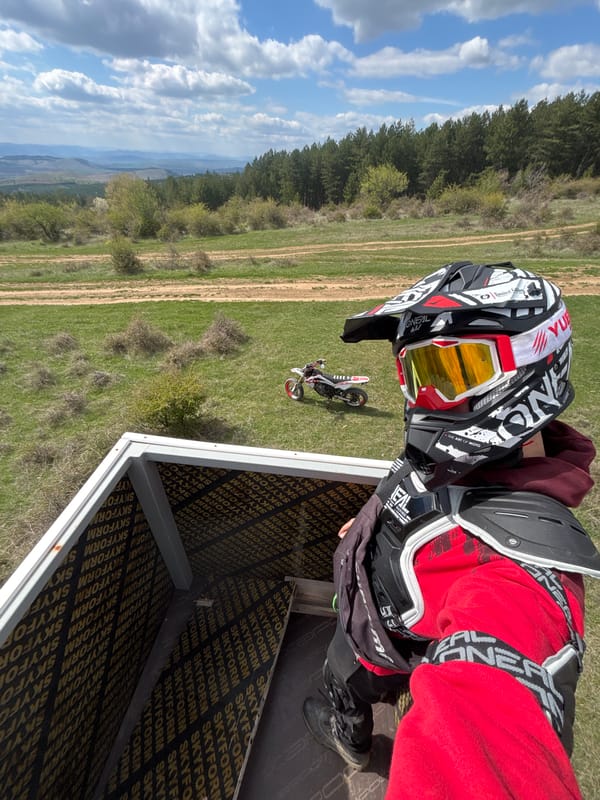 Motocross rider prepares for dirt bike session in Bulgarian countryside