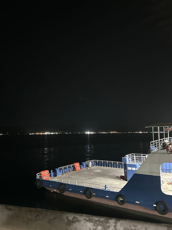 Nighttime ferry terminal activity documented in Davao City