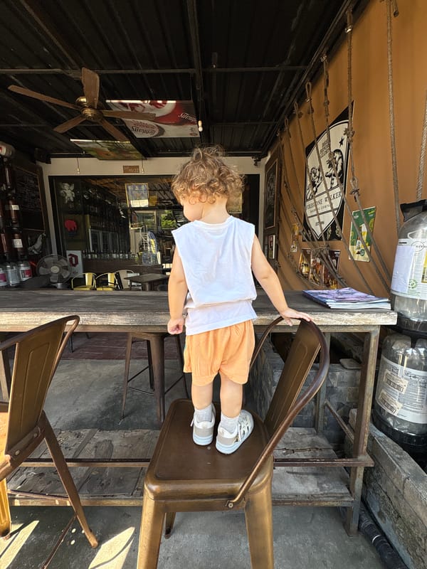 Family morning outing at colorful lantern marketplace in Thailand
