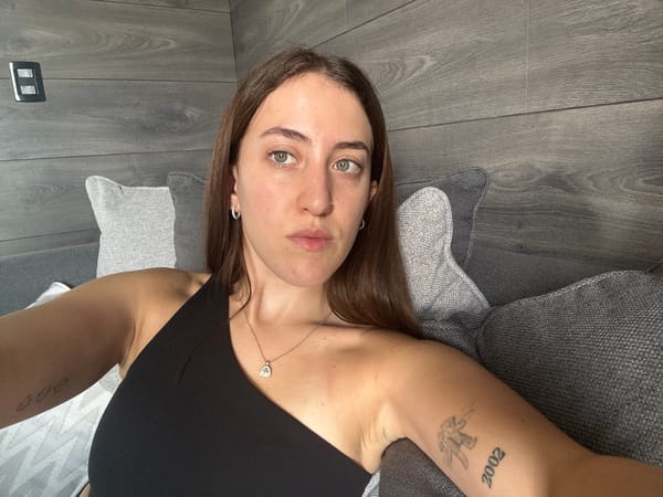 Woman rests on couch in Mexican suburb evening scene