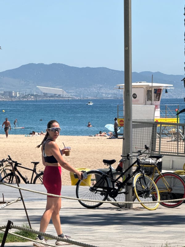 Morning beach activities documented at Barcelona's Barceloneta waterfront