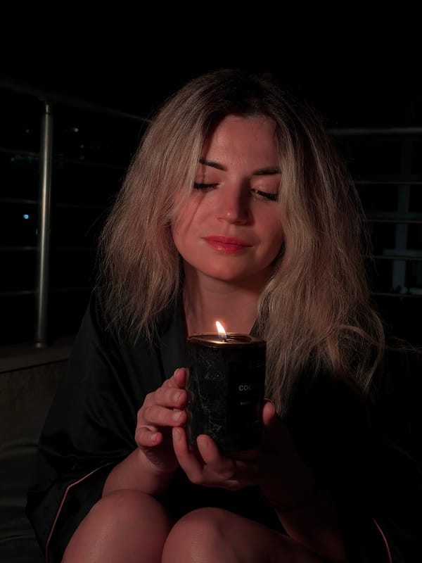 Candlelit balcony night and Budva's waterfront after dark