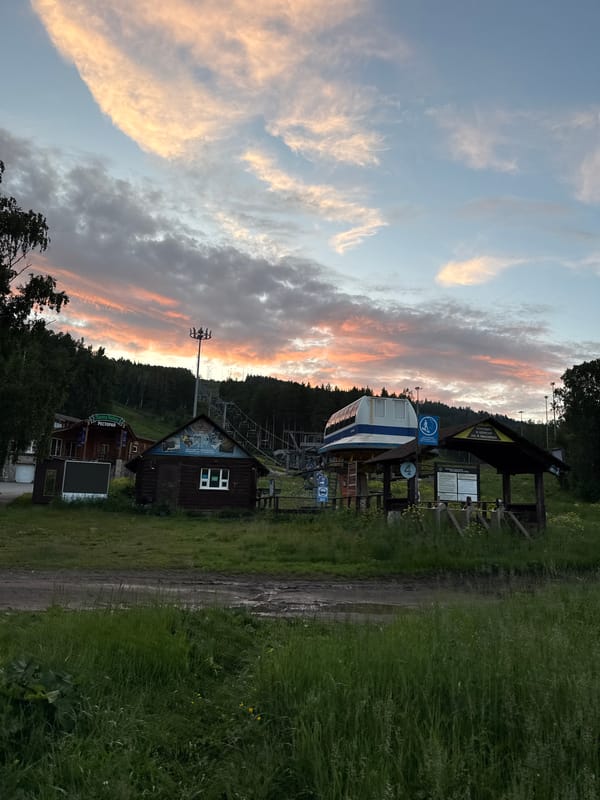 Wooden resort village in Syrostan, Russia, on a rainy summer afternoon
