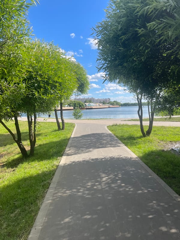 Sunny afternoon at a Moscow lakeside park and recreation complex