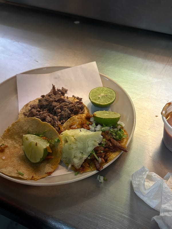 Three tacos with varied meat fillings spotted in Mexico City