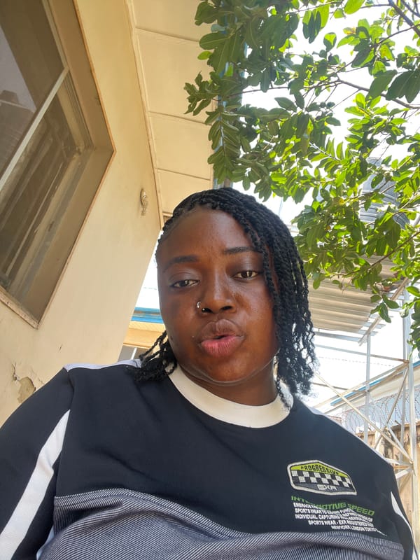 Quiet Friday morning in Abuja — indoors, outdoors, phones in hand