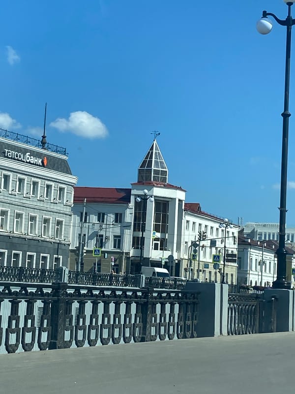 Family explores Kazan Kremlin and museums on sunny afternoon