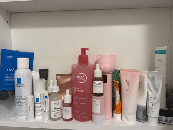 Organized skincare product shelf documented by witness