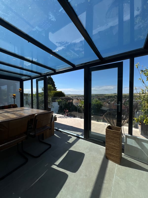 Sunny Brighton afternoon: sunroom views, bedroom windows, and tennis