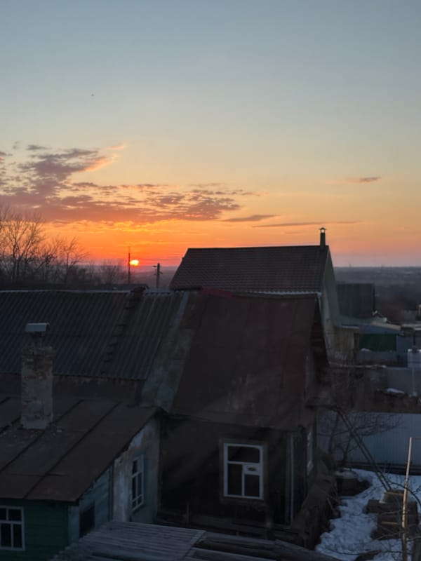 Sunset captured over Ulyanovsk cityscape from multiple viewpoints