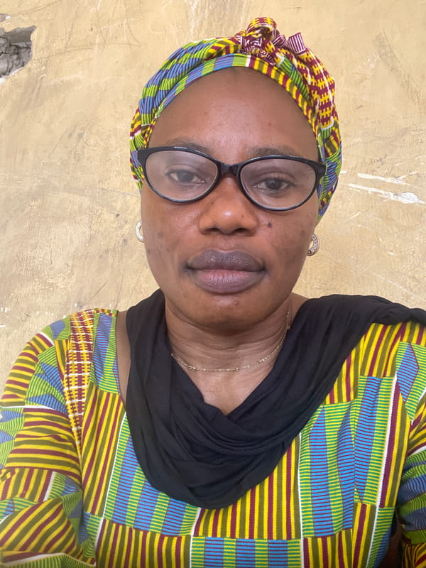 Portrait session documented in Nigerian classroom setting