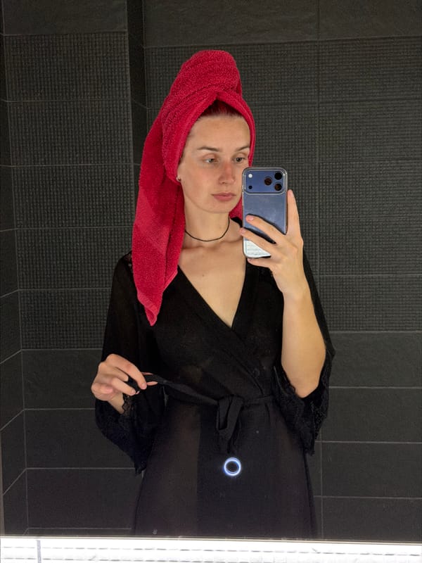 Bathroom mirror selfie in a modern Chaikovsky apartment