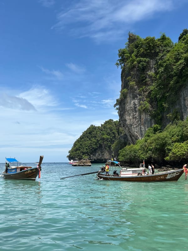 Morning tourist activities captured around Ko Thailand's limestone bays