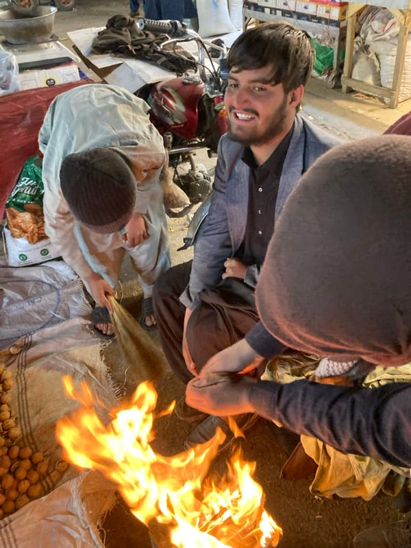 Vendors tend fire at Quetta marketplace amid nuts, dried fruits