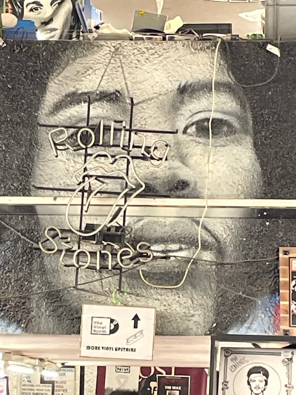 Barcelona street scenes: Rolling Stones mural, beer service documented