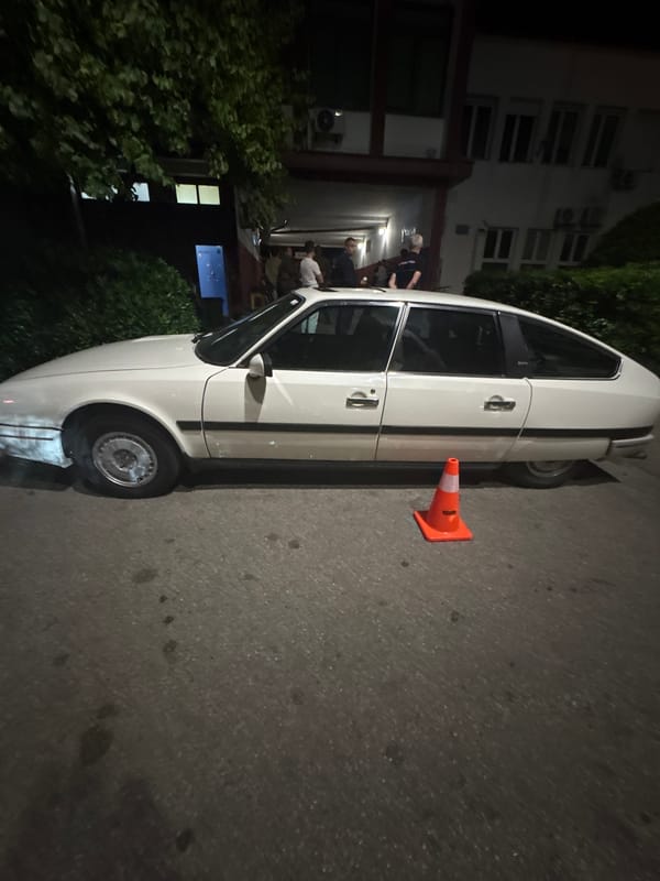 Cars parked on Podgorica street during evening hours