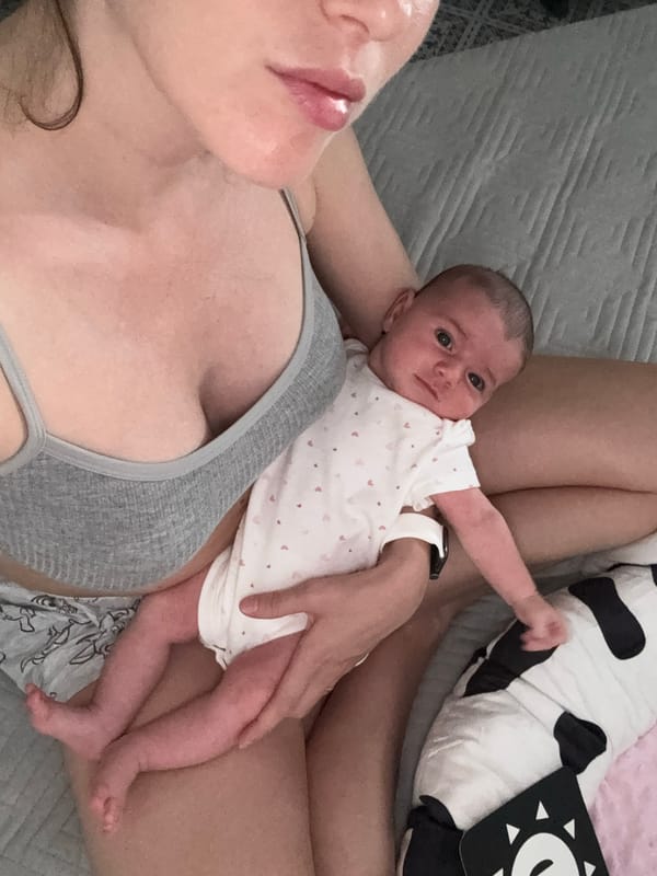 Mother and infant bonding moments captured in Italian seaside town