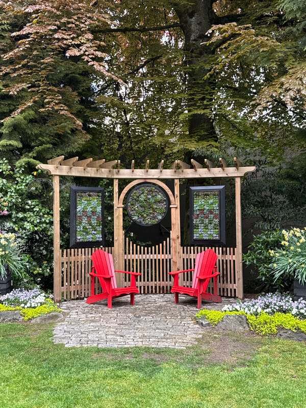 Garden documentation captures pergola, flowers, totem pole in New Westminster