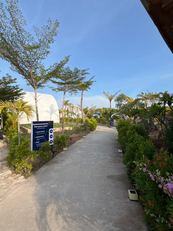 Inside and around Narayana Hotel's tropical grounds in Kemloko