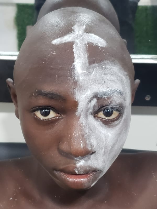 Ceremonial face painting documented in Adankolo, Nigeria at sunset