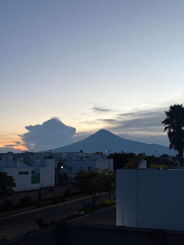 Morning smoothie prep with volcano views in Tlaxcalancingo