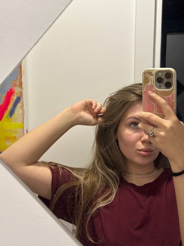 Woman poses with abstract art in Belgrade suburb