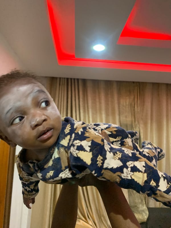 Baby care moments documented in Jos, Nigeria residence