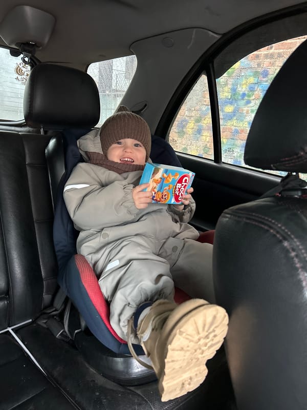Family with child spotted during rainy day in Klin