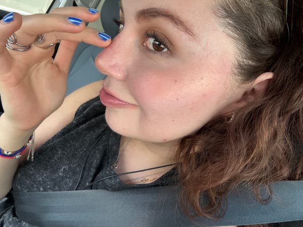 Car passengers photographed during evening ride in Mexico City