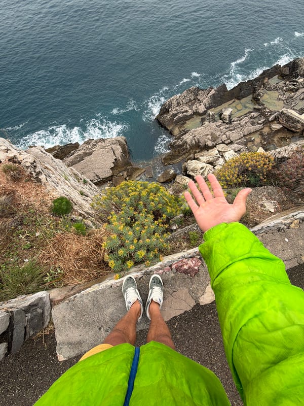 Person photographed from above overlooking Buljarica Montenegro coastline