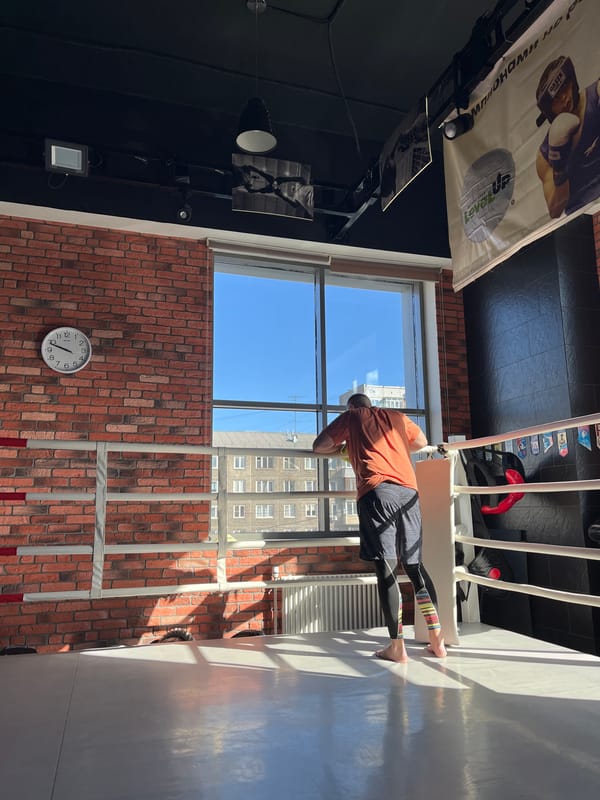 Man exercises in boxing ring at Krasnoyarsk gym