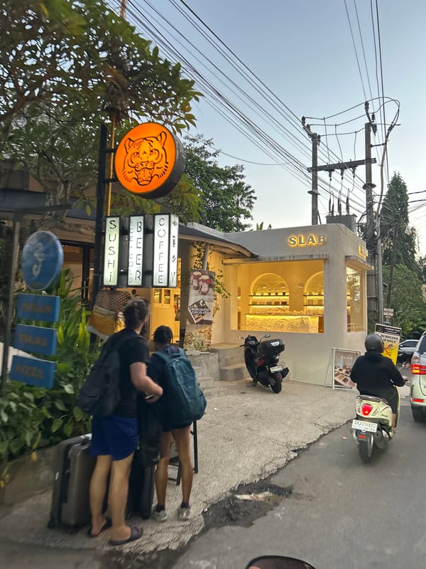 Ubud streets: temples, a bakery, and scooter traffic