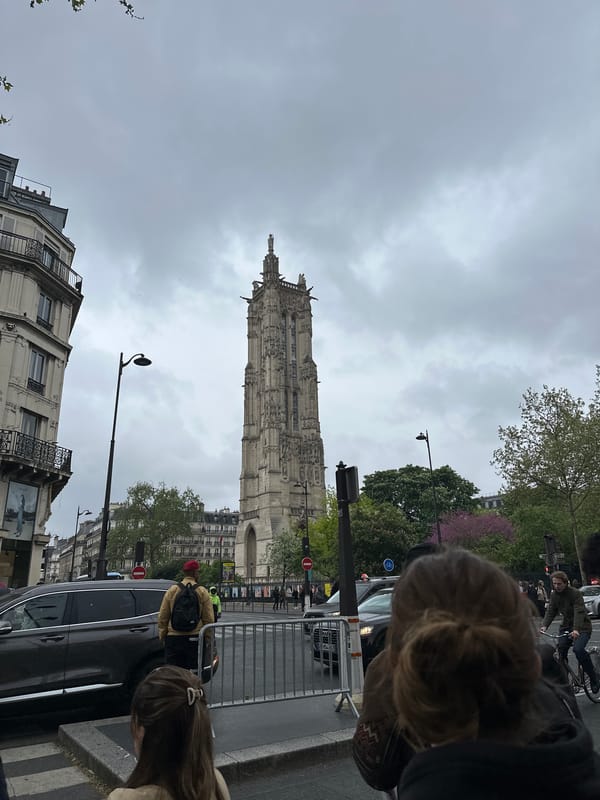Rainy afternoon scenes captured across central Paris landmarks and streets