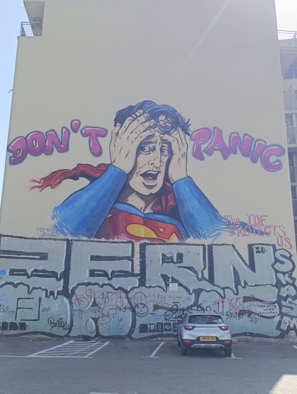Superman distress mural spotted on Tel-Aviv building wall