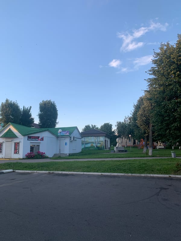 Summer evening around Kapyĺ's central square and fountain