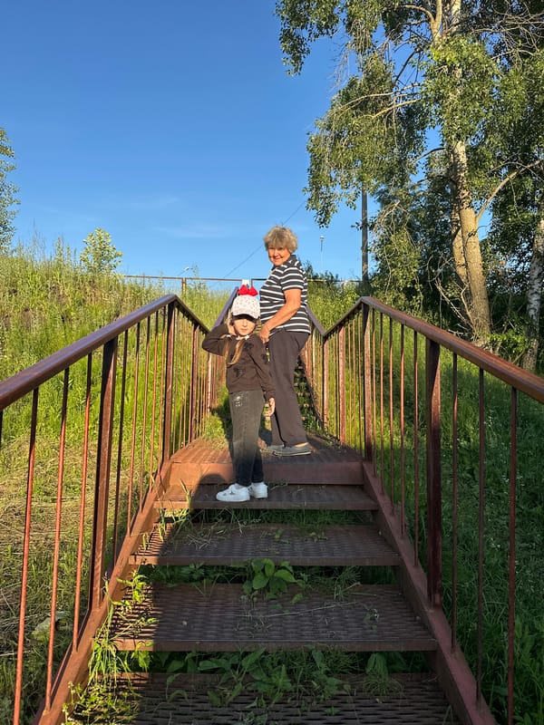 Summer afternoon at a Chaikovsky park — people, pets, and sunshine
