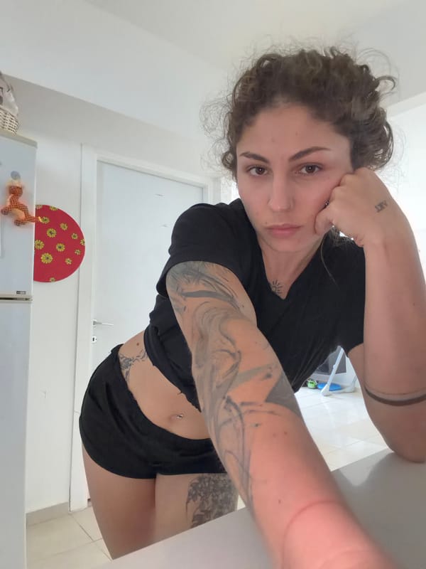 Woman exercises, takes selfies at home in Kiryat Bialik