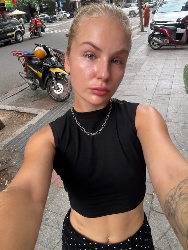 Selfie moment on a Nha Trang sidewalk, July 2026