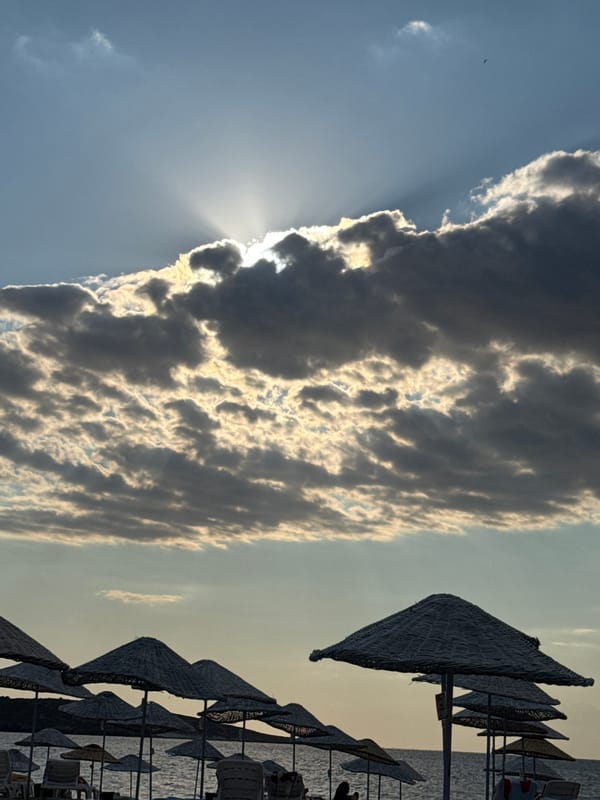 Sun breaks through storm clouds over Foça beach