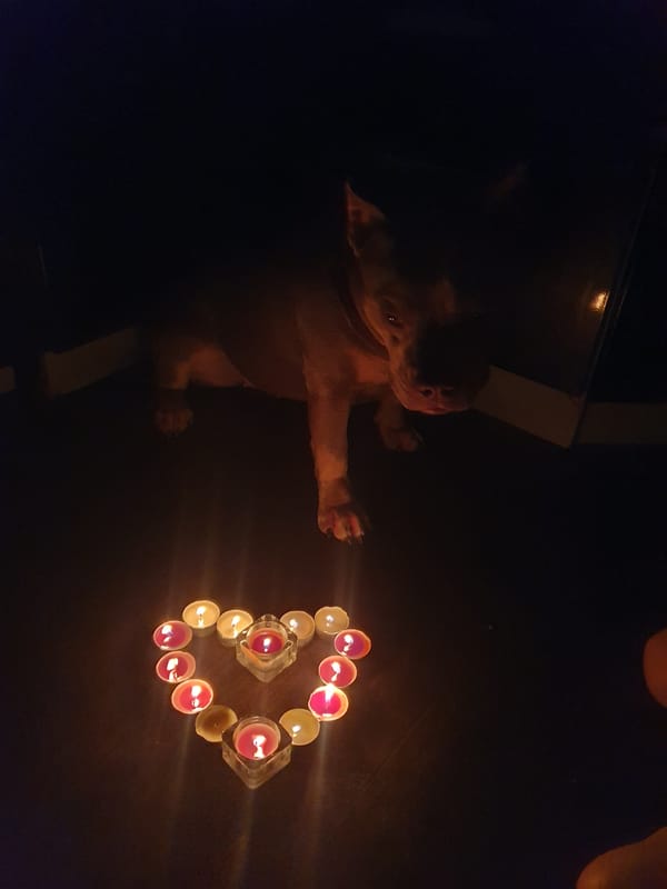 Evening self-care ritual with candles and bath documented in Ulyanovsk