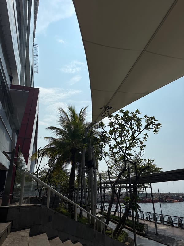 Morning waterfront park visit documented in North Jakarta