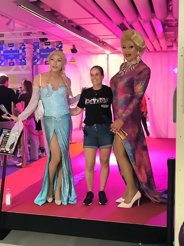 Drag performers on a pink stage in Amsterdam
