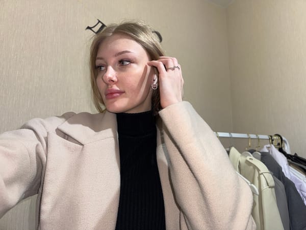 Woman takes selfies indoors in Perm, Russia