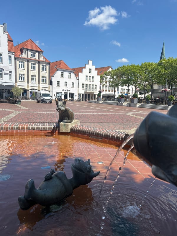 Sunny afternoon around Lingen's bronze fountain square