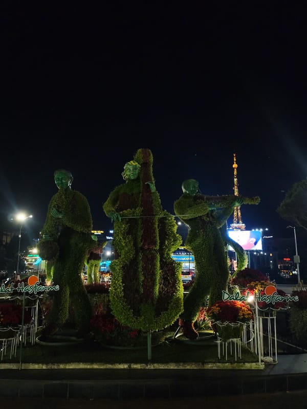 Nighttime scenes captured across illuminated Da Lat, Vietnam attractions