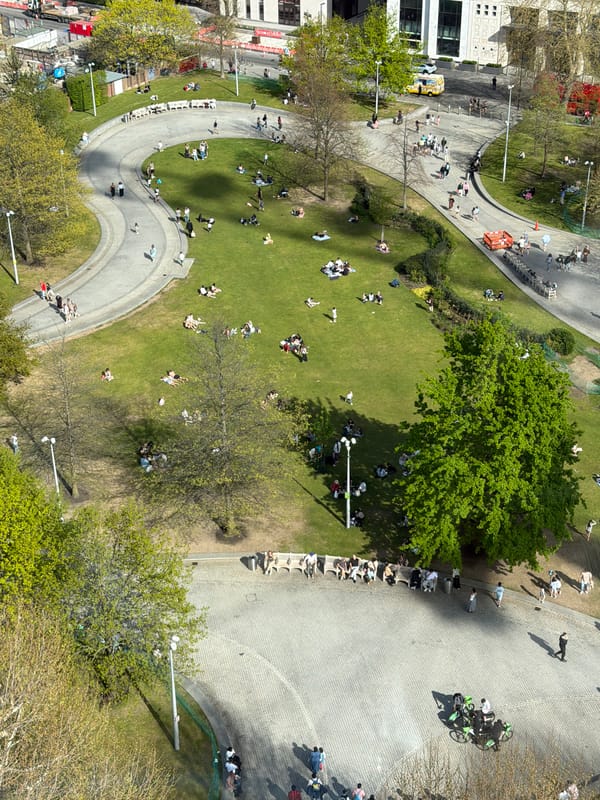 Aerial view captures Londoners enjoying sunny afternoon in Thames parks