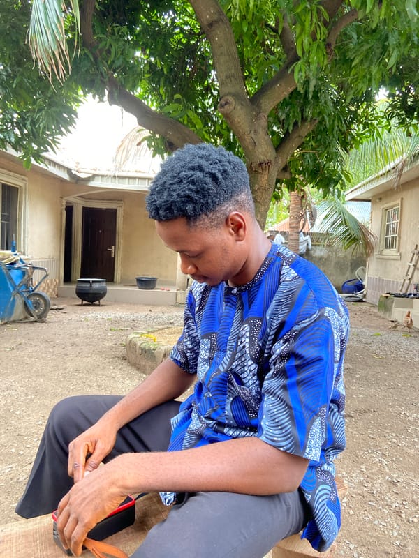 Young man poses for photos in Mararaba neighborhood