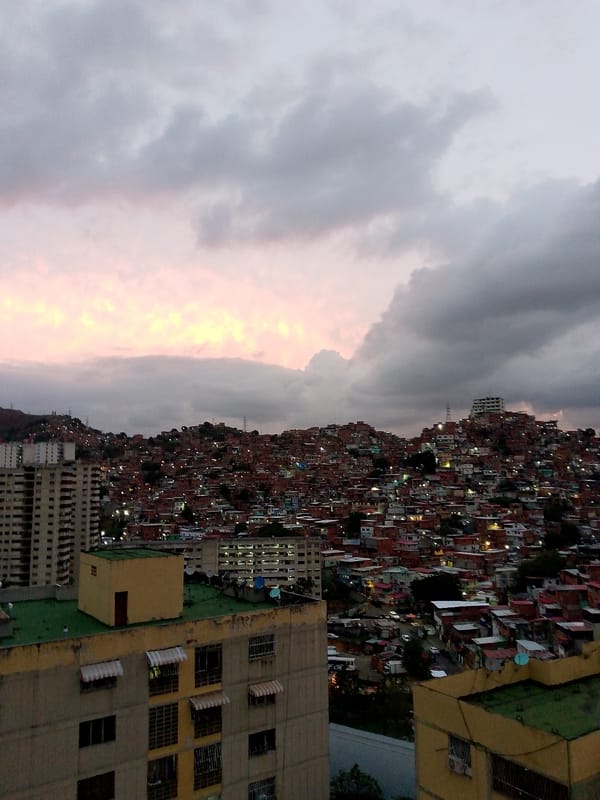 Evening scenes of daily life captured across Caracas neighborhoods