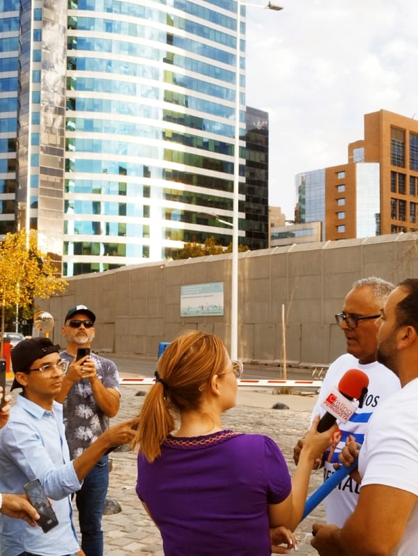 Pro-freedom demonstrators rally with Cuban, American flags in Santiago