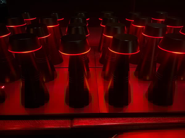DJ setup observed overlooking London cityscape at night